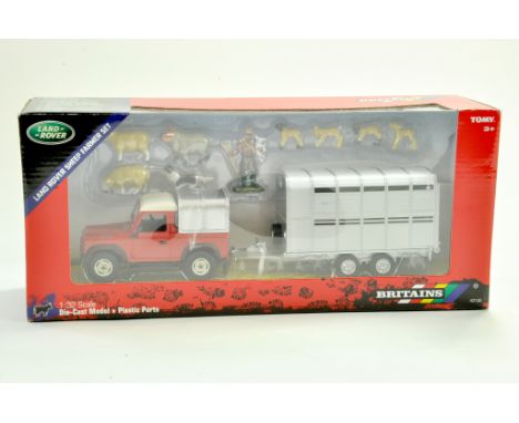 Britains 1/32 Farm issue comprising No. 43138 Land Rover Sheep Farmer Set. Appears excellent with box. &nbsp;Note: We are alw