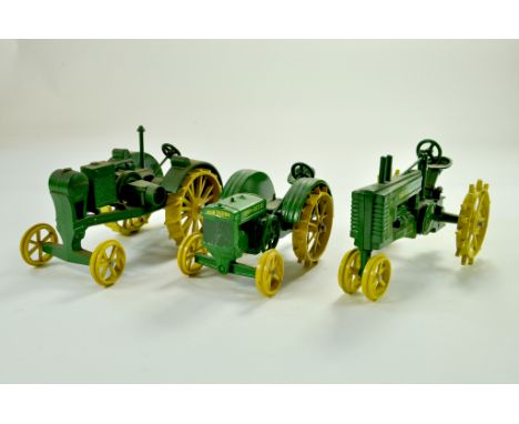 Trio of John Deere Vintage Tractor issues in 1/16. Generally very good to excellent. Note: We are always happy to provide add