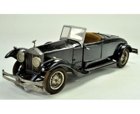 A large, approx 1/8 scale Handbuilt Model of a Rolls Royce. Some clever engineering applied resulting in a bespokely differen