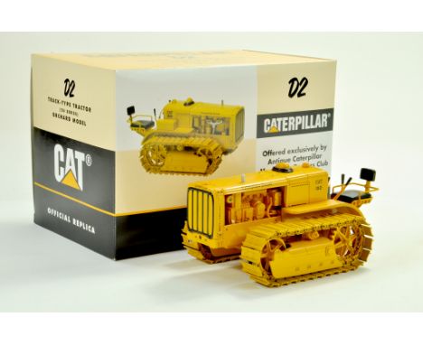 Spec Cast 1/16 CAT Caterpillar D2 Crawler Orchard Tractor. Stunning piece appears excellent with box.  &nbsp;Note: We are alw