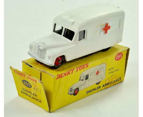 Dinky No. 253 Daimler Ambulance. Very good to excellent, minimal age wear in fair box. Note: We are always happy to provide a