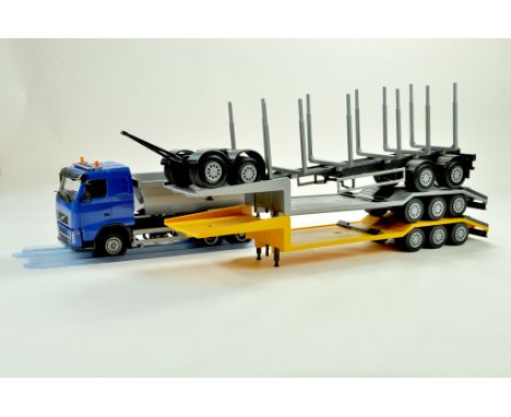 Emek large scale plastic truck with trio of trailers. Appears good. 1/24 scale. Note: We are always happy to provide addition