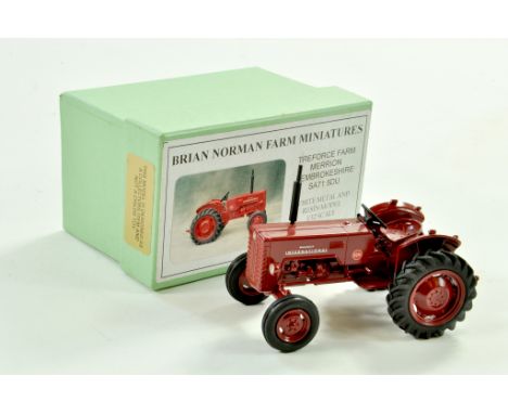 Brian Norman 1/32 Farm Issue comprising Hand built International B250 Tractor. Superb item is excellent with original box.  N
