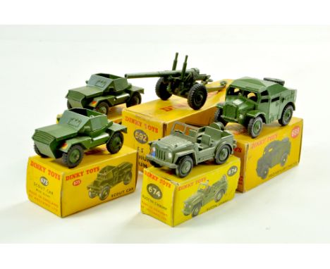 Dinky Group of Military Vehicles comprising Scout Car, Austin Champ, Artillery Tractor, Medium Gun and Scout Car. All general