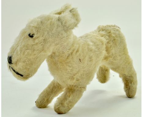 Unusual but well groomed small dog, terrier type. Well loved but still good.  Note: We are always happy to provide additional