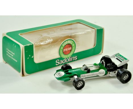 Corgi No. 153 Surtees Racing Car. Issue is German promotional model in the livery of Salodins. Appears to be very good to exc
