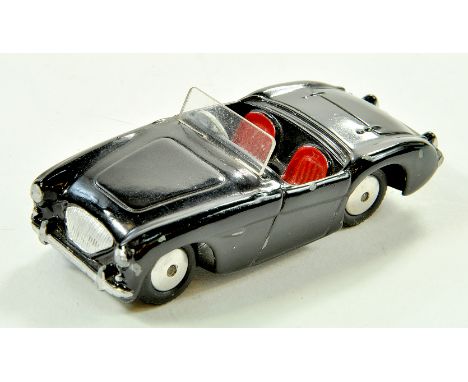 Corgi No. 300 Austin Healey Sports Car in black. A few specks of wear in places. Otherwise good to very good. Note: We are al