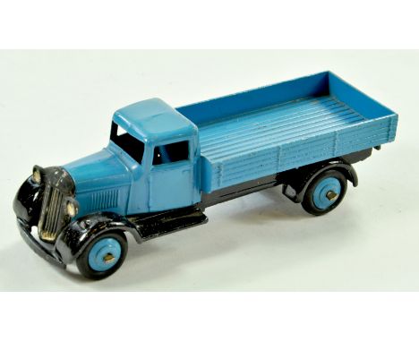Dinky No. 25a Open Back Wagon. Issue has mid-blue cab, back and ridged hubs with black chassis. Appears to be very good to ex