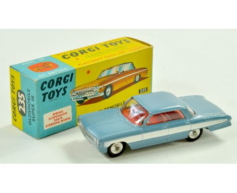 Corgi No. 235 Oldsmobile Super 88. Issue is light metallic blue with white side flashes, silver trim, red interior and spun h