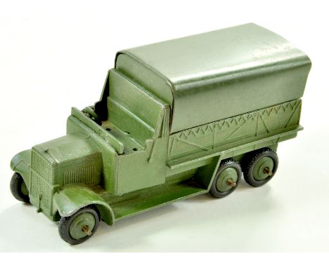 Dinky No. 151b Military Covered Wagon. Issue is in military green with green body, tin tilt and ridged hubs. Appears very goo