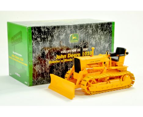 Ertl 1/16 Farm Issue comprising John Deere 1010 Industrial Crawler Tractor. Generally Excellent with box.  &nbsp;Note: We are