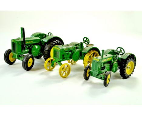 Trio of John Deere Vintage Tractor issues in 1/16. Generally very good to excellent. Note: We are always happy to provide add