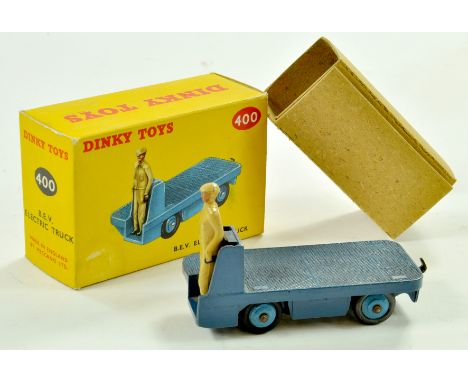 Dinky No. 400 BEV Electric Truck. Issue is dark blue with light blue hubs. Harder example to find is generally very good to e