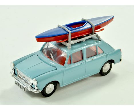 Triang Spot-On No. 274 Morris 1100 with Canoe. Issue is light blue with red interior plus plastic canoe. Appears very good to