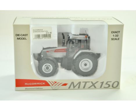Universal Hobbies 1/32 Farm Issue comprising McCormick Diamond Edition Tractor. Appears excellent with box.  &nbsp;Note: We a