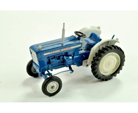 Britains 1/32 Farm issue comprising Ford 5000 Tractor. Well preserved, albeit repro exhaust, with lower than usual wheel melt