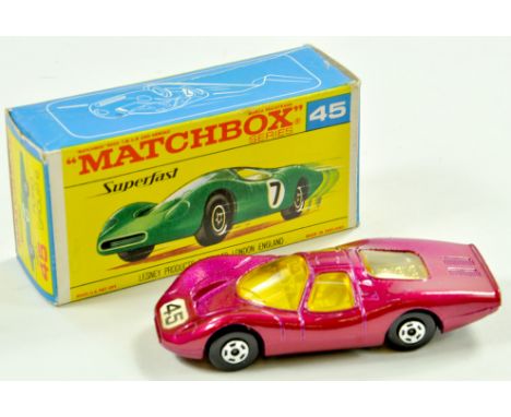 Matchbox Superfast No. 45a Ford Group 6. Issue has metallic magenta body with racing number 45, amber windows, ivory interior