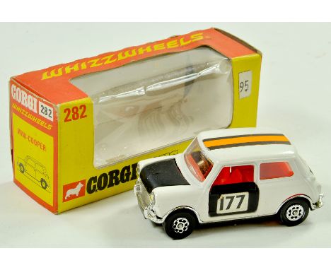 Corgi No. 282 Whizzwheels Mini-Cooper. Generally very good, some rubbing to chrome work in good to very good box. Note: We ar