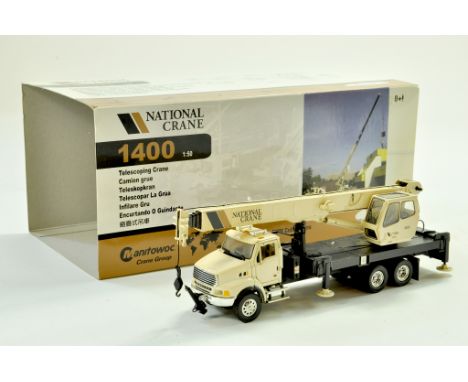 TWH 1/50 diecast truck issue comprising National Crane 1400 Telescopic Crane Truck. Appears very good in box, inner packaging