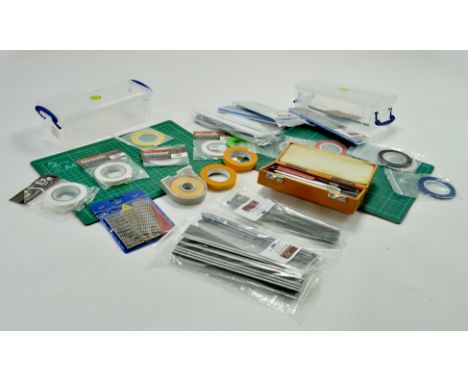 Large assortment of unused model making accessories comprising tape, sanding files, cutting set and others.  Note: We are alw