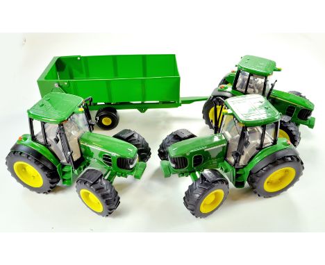 Britains 1/16 Farm issues comprising Big Farm John Deere Tractor and Trailer issues.  Note: We are always happy to provide ad