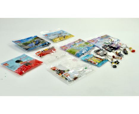 Various Lego Minifigure packs, including Star Wars and others. Unopened.  Note: We are always happy to provide additional ima