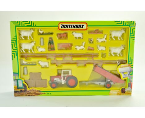 Matchbox No. FM-9 Tractor Farm Set. Excellent in very good box. Hard to find.  Note: We are always happy to provide additiona