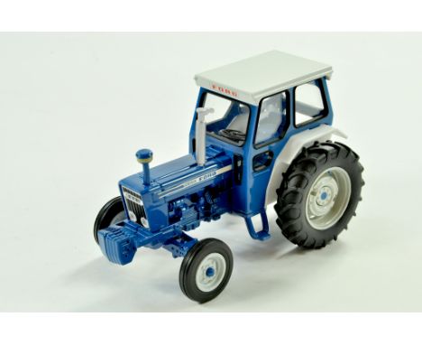 Britains 1/32 Farm issue comprising converted Ford 7600 Tractor. Example has new steerable front axle plus rear wheels upgrad