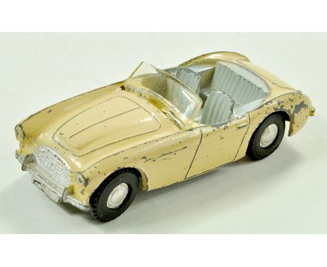 Triang Spot-On No. 105 Austin Healey 100-Six in beige. Good with notable age wear. Note: We are always happy to provide addit