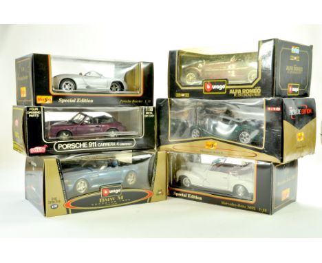 A group of Burago and Maisto 1/18 diecast car issues comprising various makers. Appear very good to excellent in slightly gru