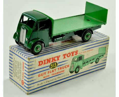 Dinky No. 513 Guy Flat Truck with Tailboard. Issue is two-tone green. Appears a fine example, hence very good to excellent in