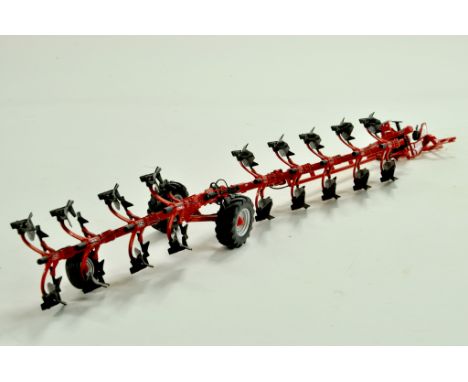 Universal Hobbies 1/32 farm issue comprising 9 Furrow Gregoire Besson Plough. No box, but appears excellent.  &nbsp;Note: We 