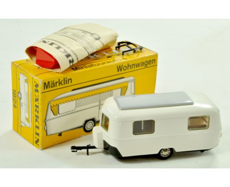 Marklin No. 1824 Caravan. Issue has white body, grey roof panel with instruction/accessory. Generally very good to excellent,