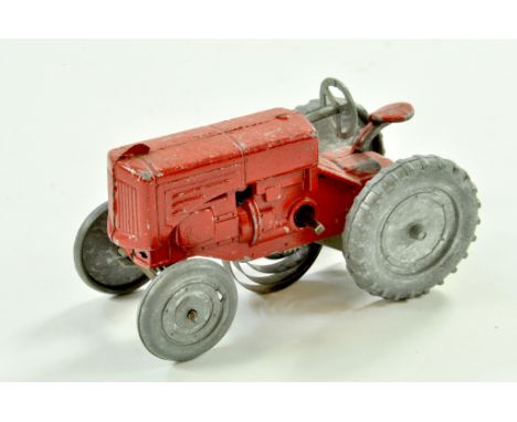 Pure Rubber Products, Pre-Benbros Minneapolis-Moline Tractor. Mechanical version in red. Untested however toy apears well pre
