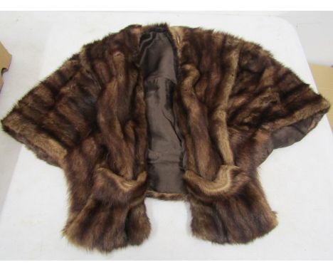 A vintage fur shrug with pockets&nbsp;