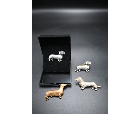 4 Dachshund label pins including 2 English Pewter pins signed A R Brown, a vintage Kenart pin and one other