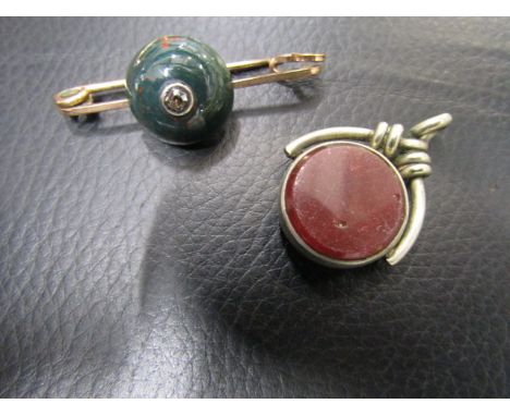 A vintage gold (not hallmarked, but tests as 9ct gold)&nbsp; Diamond and bloodstone bar brooch, and a white metal Carnelian a