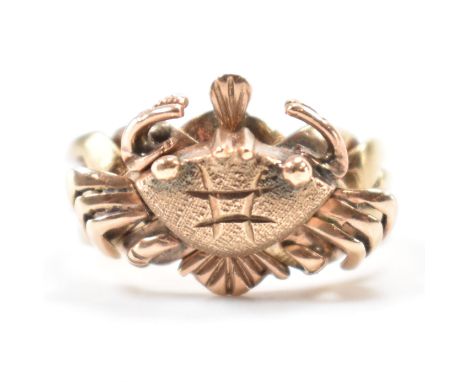 A vintage gold crab puzzle ring. The ring having four interlocking rings forming a crab to the head. Unmarked, tests indicate