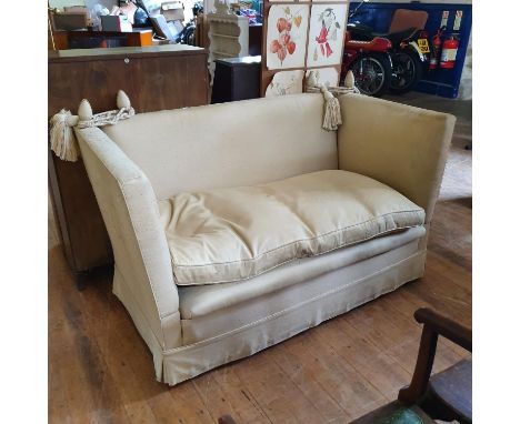 A cream knole sofa, an armchair, a mirror and a set of eight prints mounted on a board (4) 