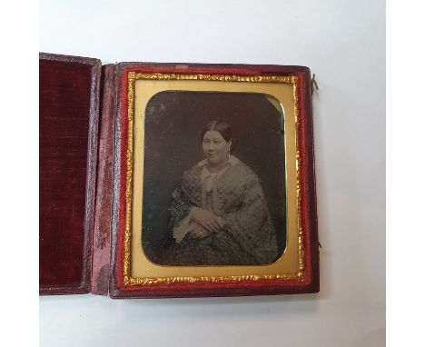 A Victorian ambrotype, others similar, and a pair of opera glasses, lacks a small section (qty) 