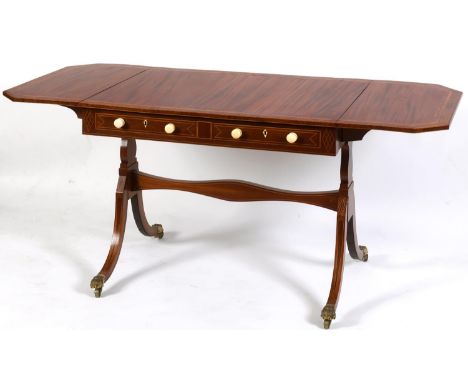 A 19th century mahogany sofa table, the top with satinwood and rosewood crossbanding, boxwood and satinwood stringing with a 