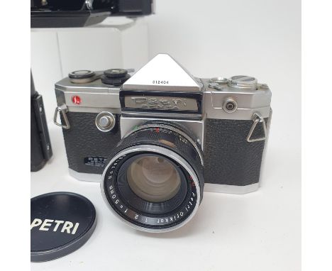 A Petri Penta camera in leather case, A Zenit EM camera in leather case and a Zeiss Ikon Nettar camera in leather case (3) 