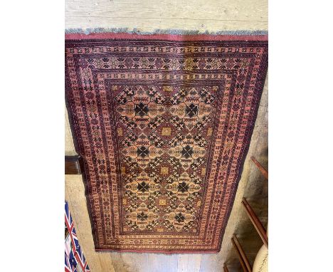 A Persian red ground rug, 220  x 133 cm and a red ground runner, 199 x 63 cm 