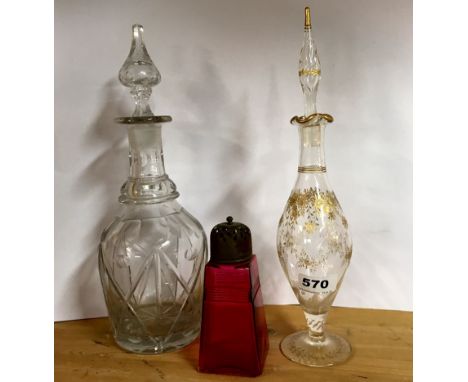 A 19th Century French perfume bottle, a Georgian decanter and a cranberry glass sugar shaker, perfume bottle H. 33cm.