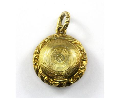 A Georgian yellow metal (tested 15ct gold) portrait pendant, L. 3cm. Weight. 5.1g.