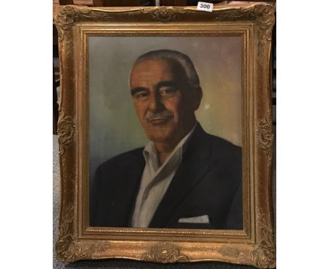 A gilt framed oil on canvas portrait of a gentleman, framed size. 55 x 65cm.