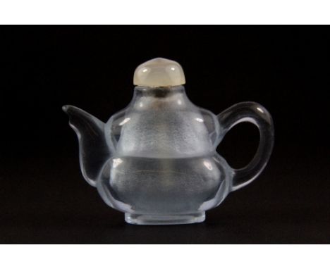 An unusual Chinese carved rock crystal teapot shaped snuff bottle, H. 6cm.