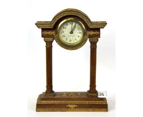 An early 20th Century gilt mounted portico clock, H. 22cm.