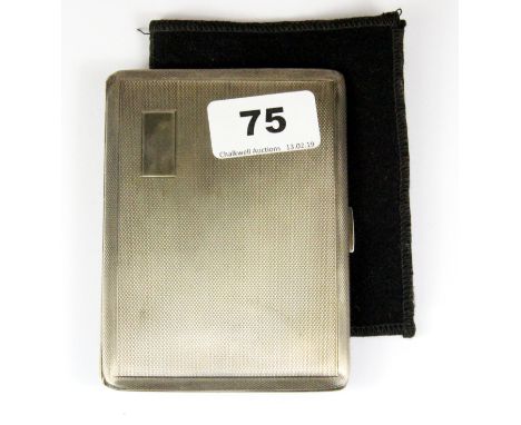 A hallmarked silver cigarette case with engine turned decoration, 11.5 x 8.5cm.