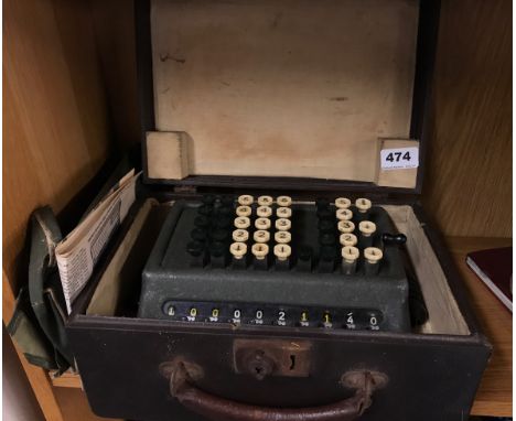 A cased vintage adding machine, case size 31 x 20 x 14cm.
